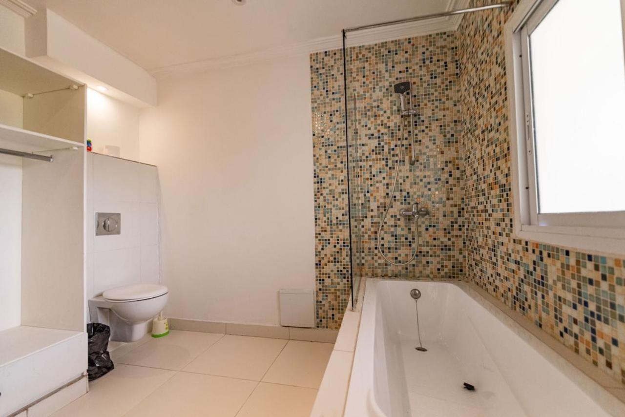 Villa Magnum Douala Bagian luar foto