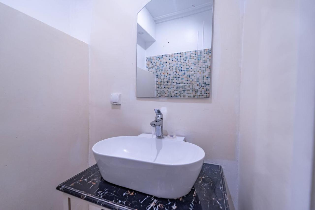 Villa Magnum Douala Bagian luar foto